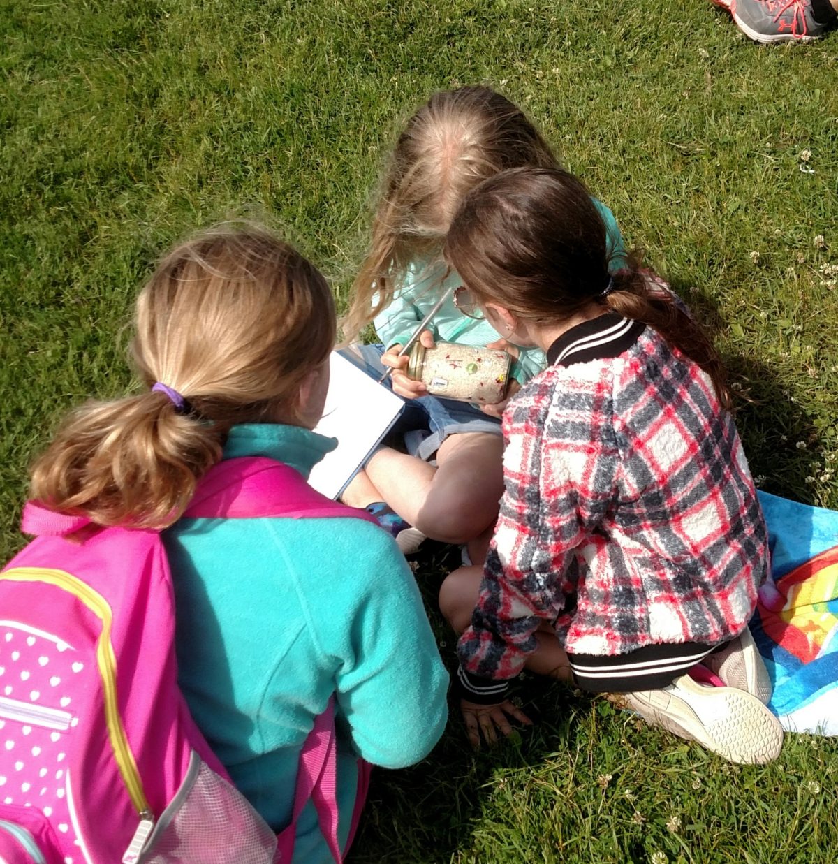 Girls using jar game » FoxWolf Watershed Alliance