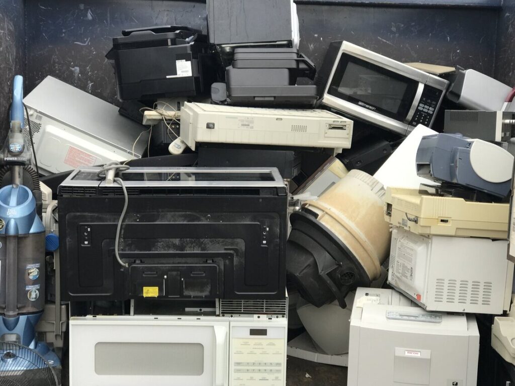electronics in a dumpster