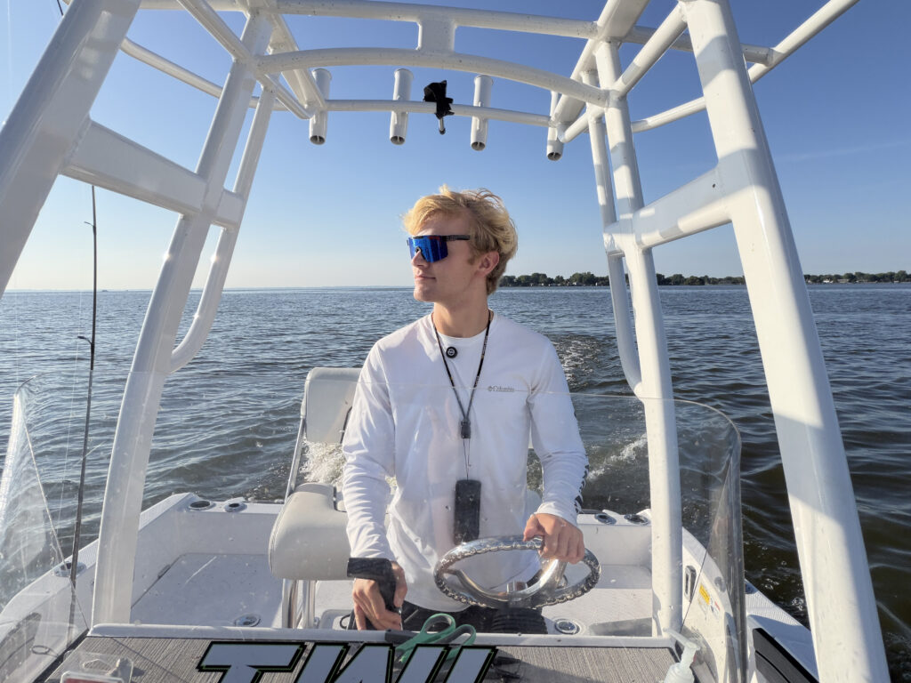Matthew Crawford driving his boat on Lake Winnebago