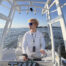 Fisherman Matthew Crawford driving his boat on Lake Winnebago after a morning of fishing